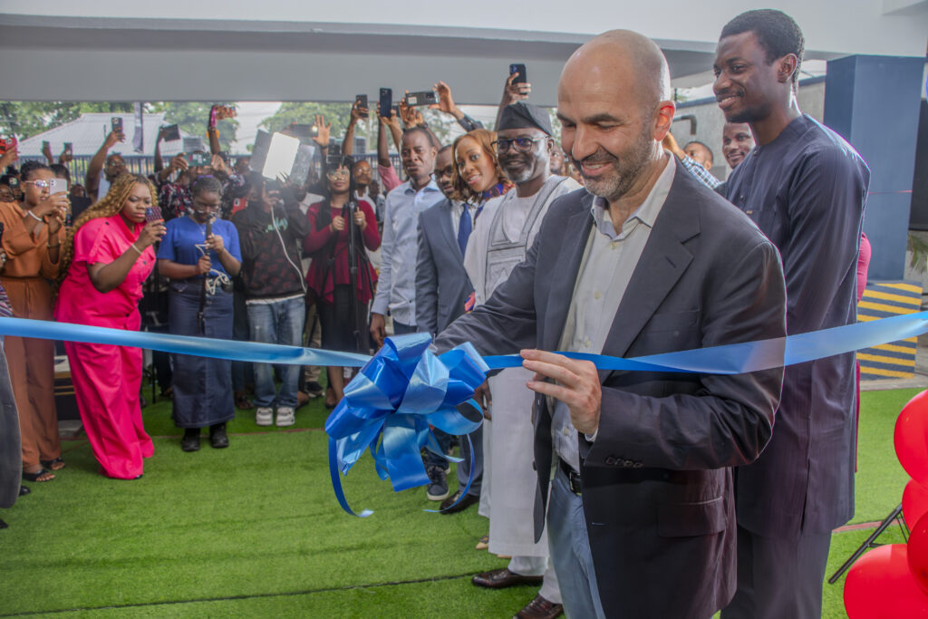 Ido Sum, Partner at TLcom Capital, cutting the ribbon at the Lagos Study Centre grand opening.